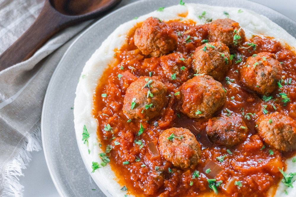 Slow Cooker Meatballs on top of cauliflower mash.